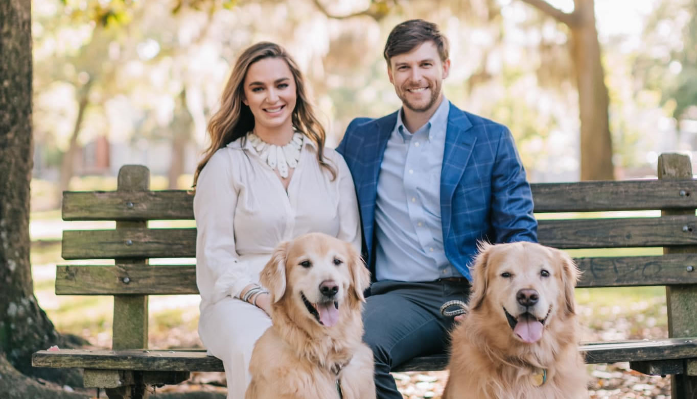 Chris and Brycen with their dogs
